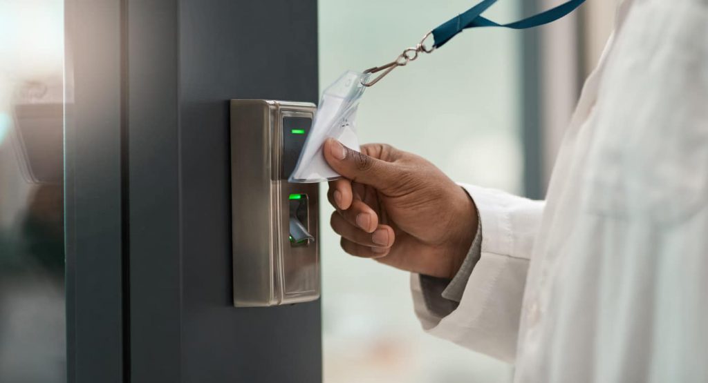 man using security card scanner