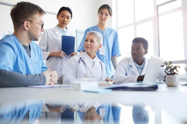 medical professionals have group discussion